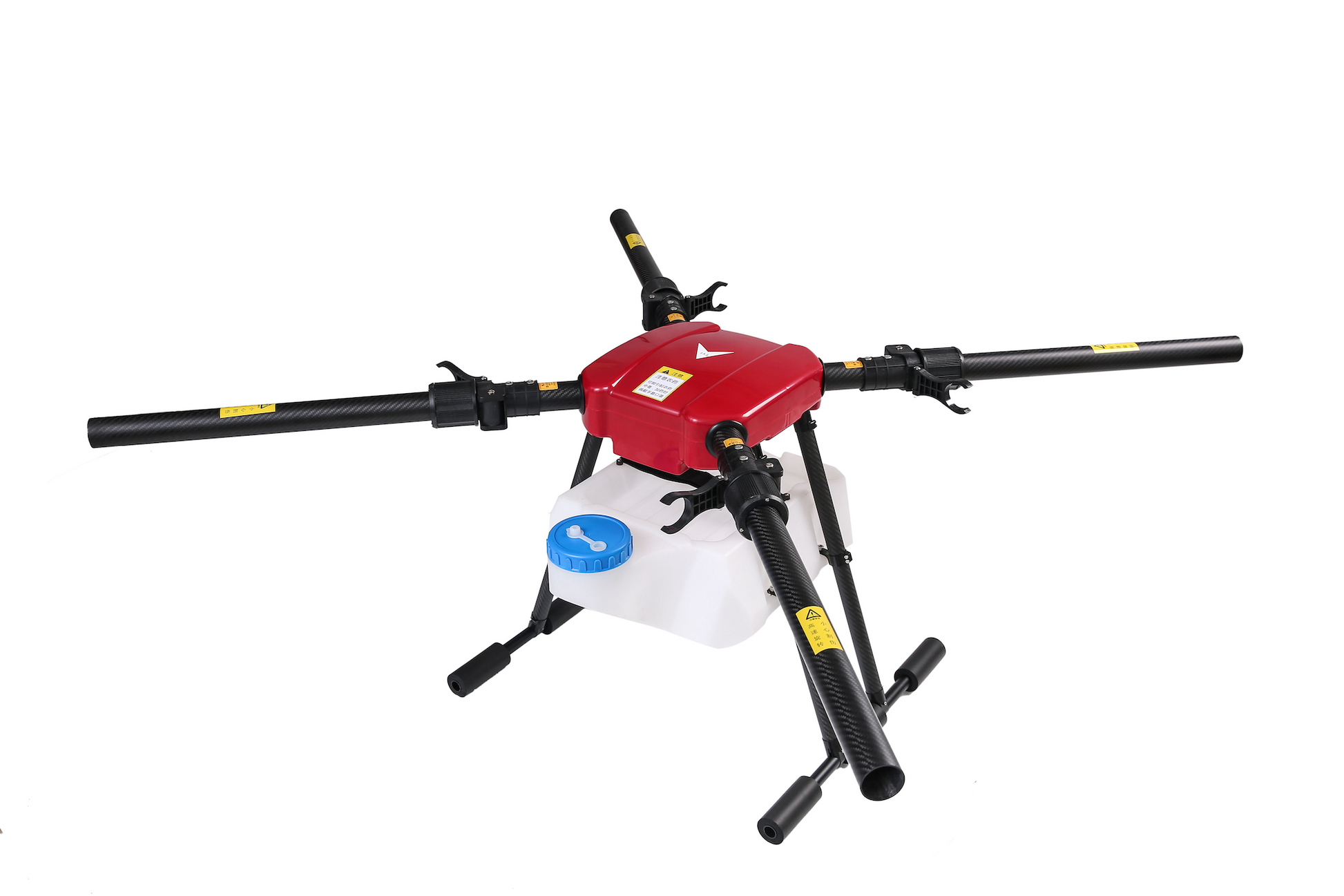 Agricultural sprayer drone angled view, red body, black arms, four propellers and tank.