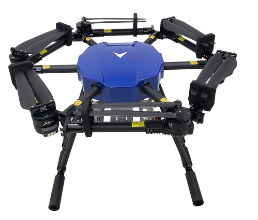 Agricultural spraying drone with blue tank and six propeller arms, black frame